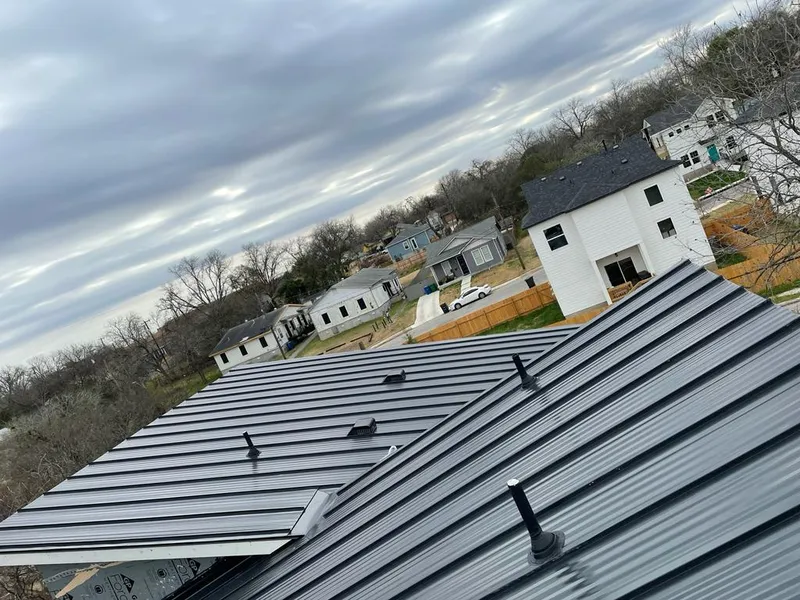 Standing seam metal roof panels with vents for Skylight Repair in Gary